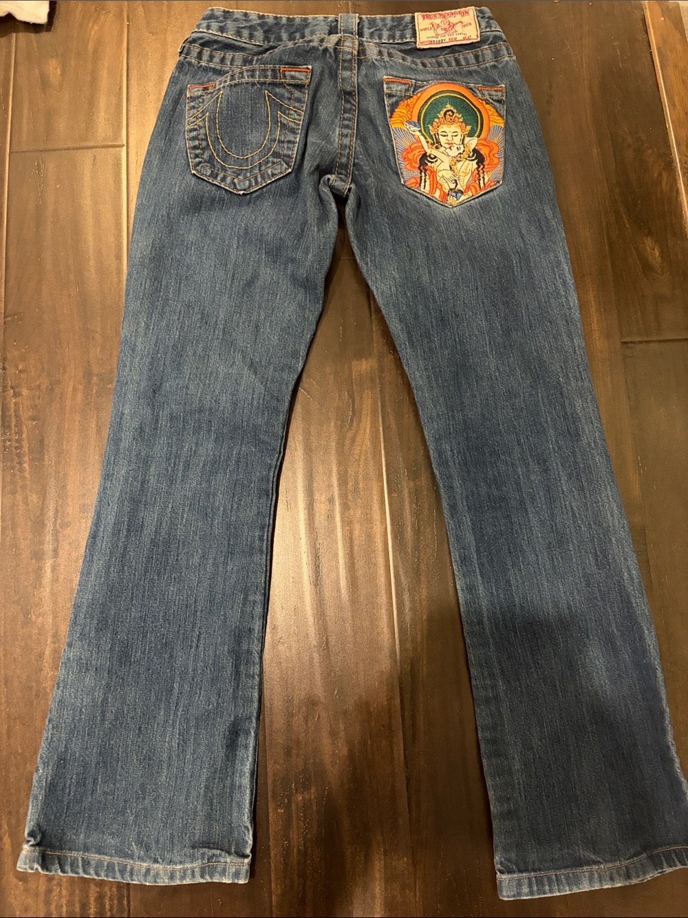 True Religion Blue Denim Flare Jeans with Embroidered Pocket Artwork